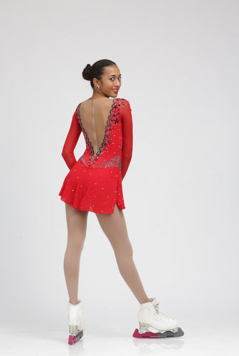 Red Figure Skating Dress Ice skating dress accented with Black Swarovski Crystals by Tania Bass
